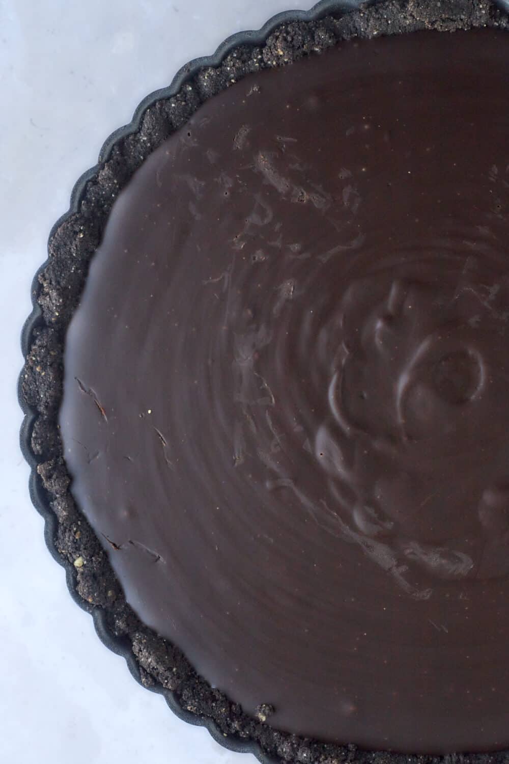 a tart with a chocolate crust and chocolate filling