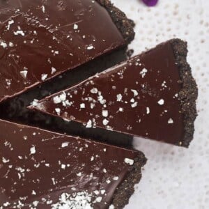 a slice of hazelnut chocolate tart topped with salt
