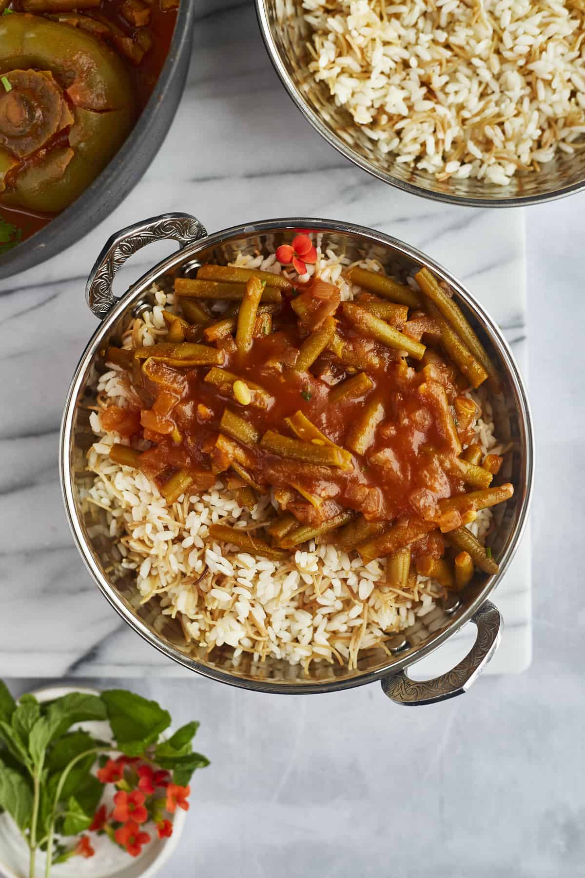 overhead image of green bean stew served over rice