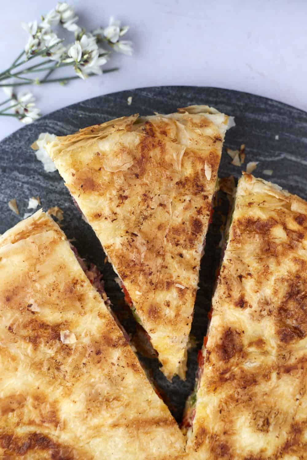a piece of veggie phyllo pie