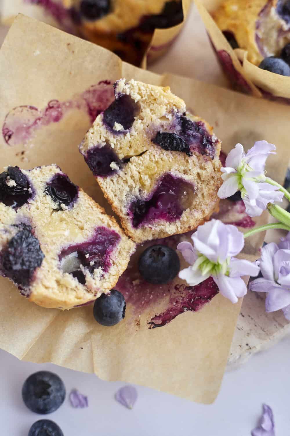 a banana blueberry muffin sliced in half