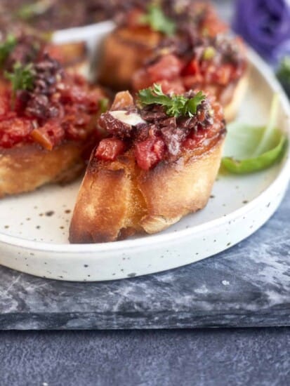 olive tapenade brushetta on a plate