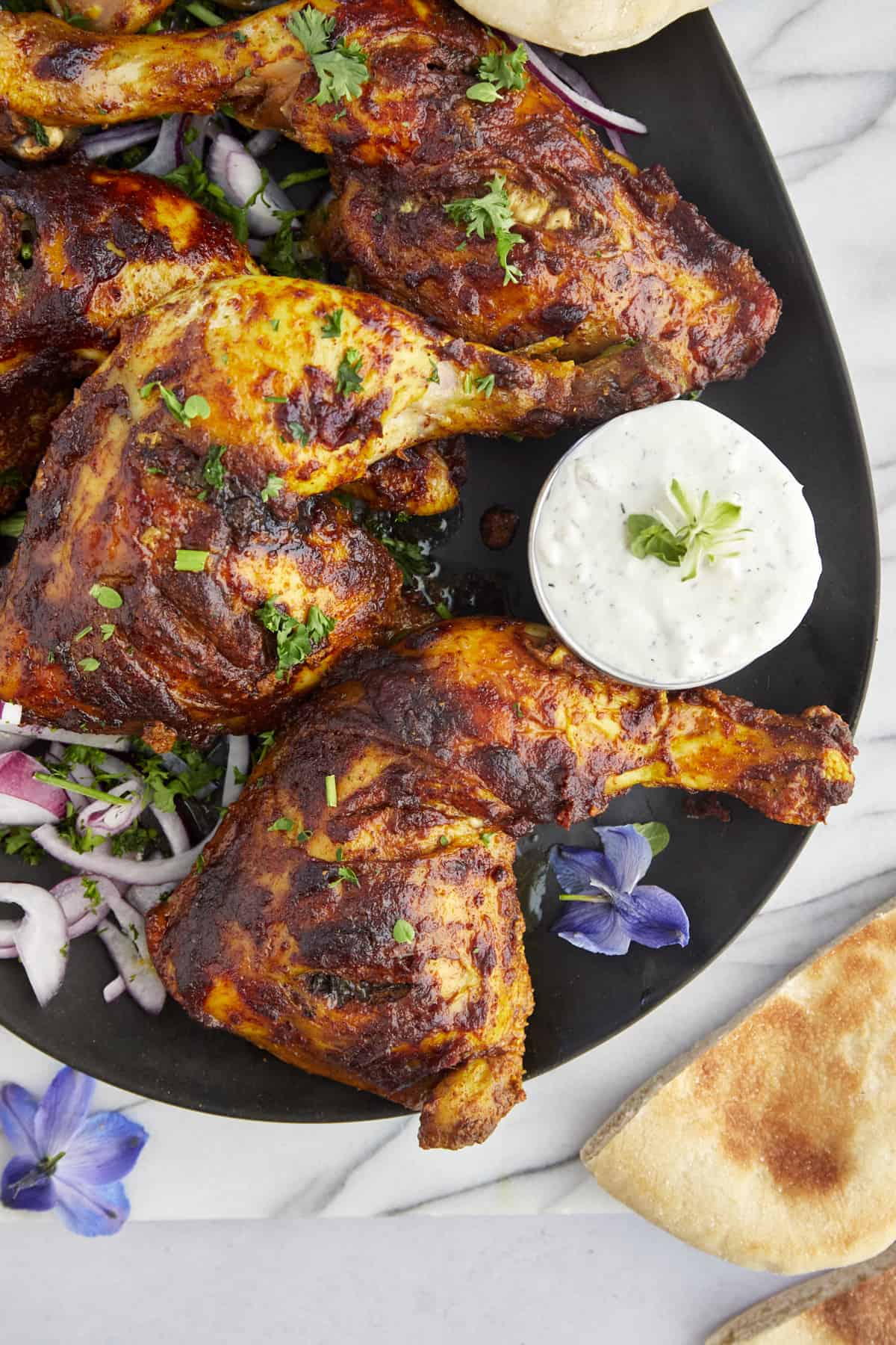 tandoori chicken legs on a plate