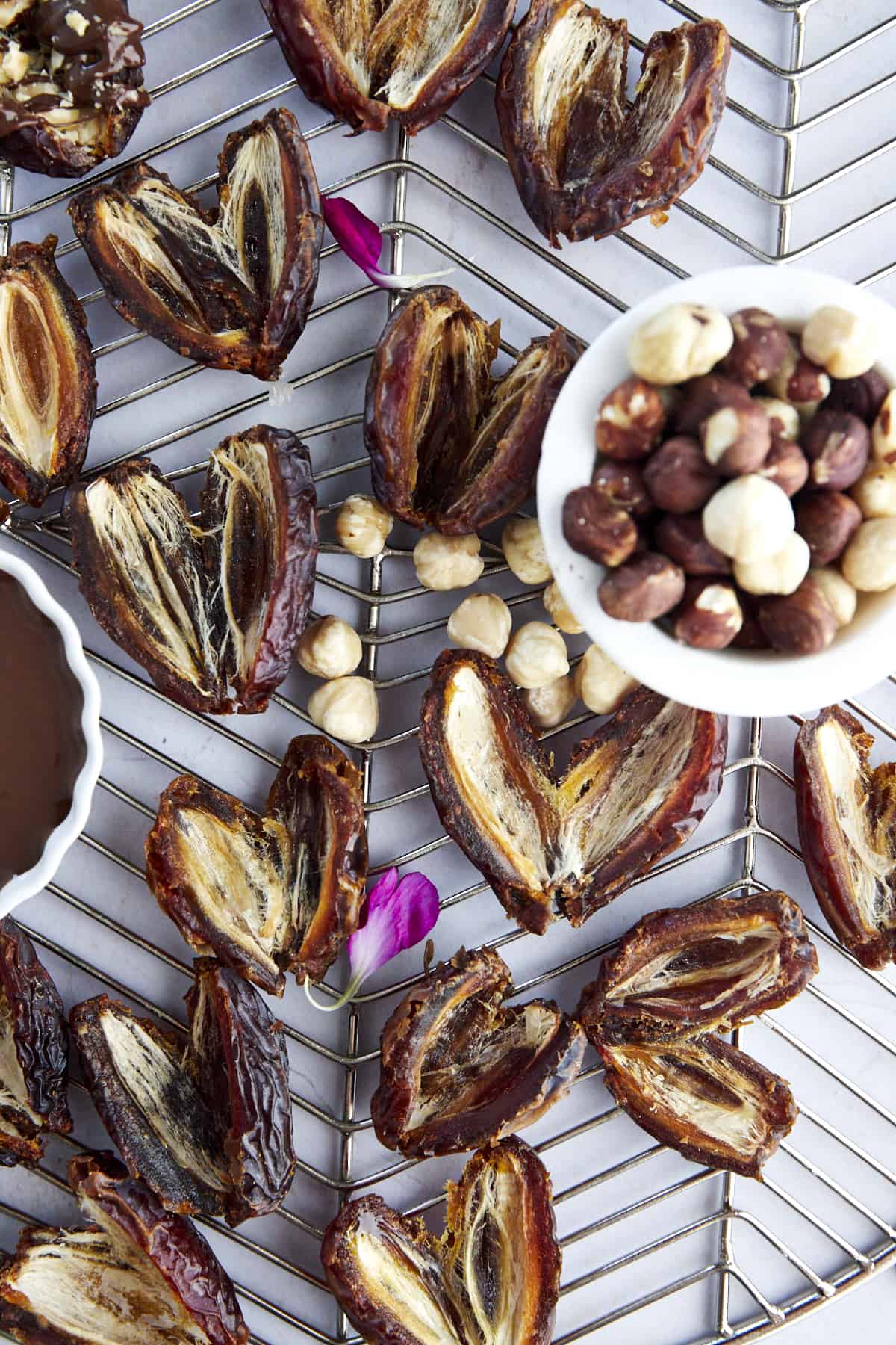 pitted heart-shaped dates on a wire rack