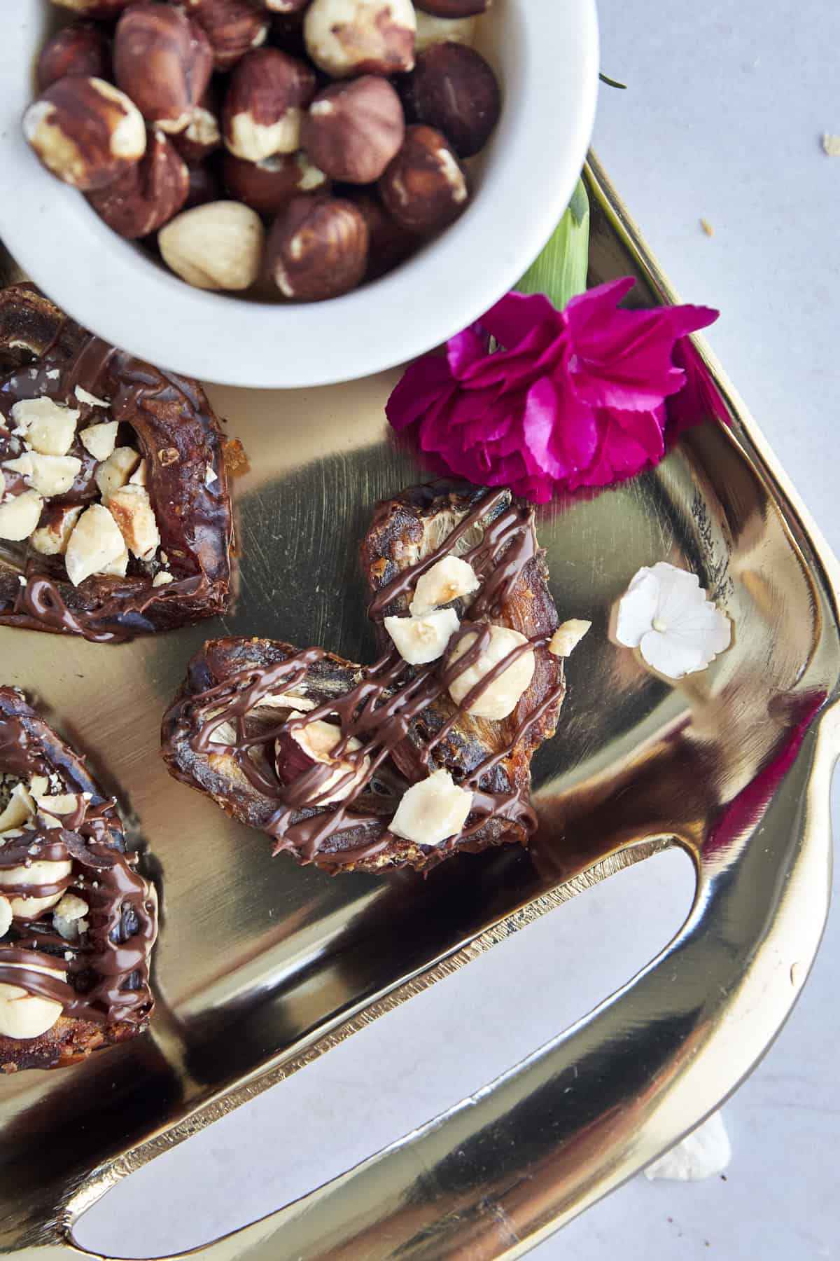 A hazelnut stuffed heart-shaped date. 