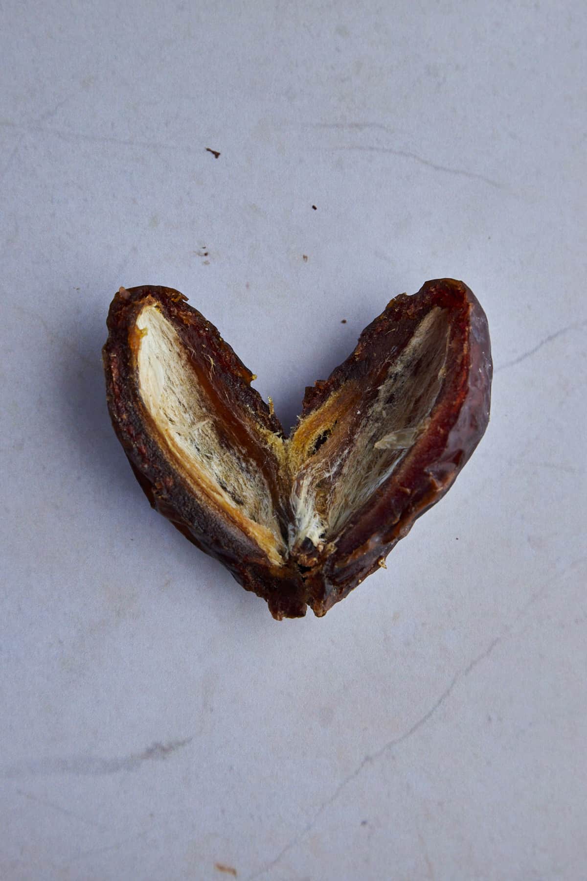 a pitted Medjool date in the shape of a heart