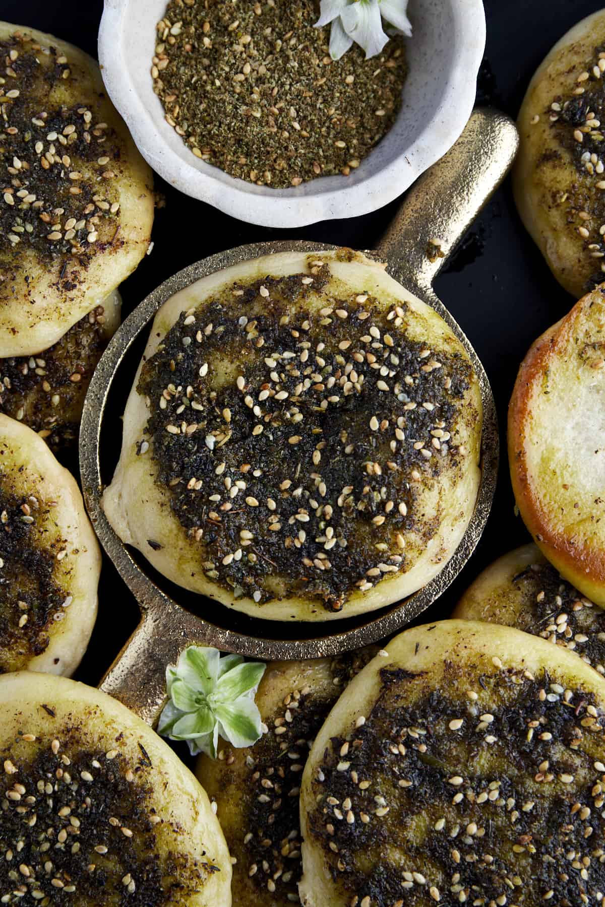 baked manakeesh topped with za'atar and olive oil 