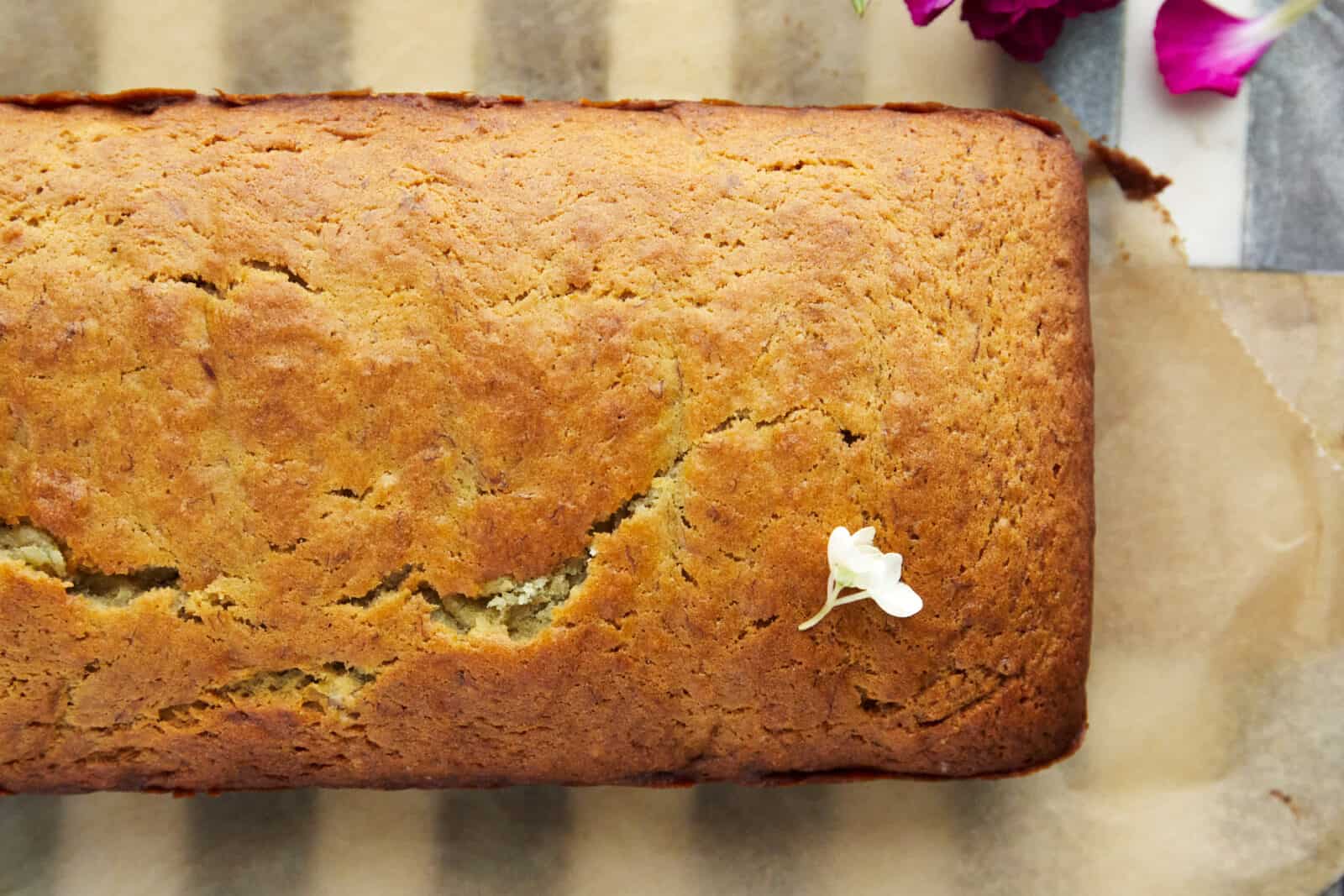 overhead image of a loaf of baked banana bread