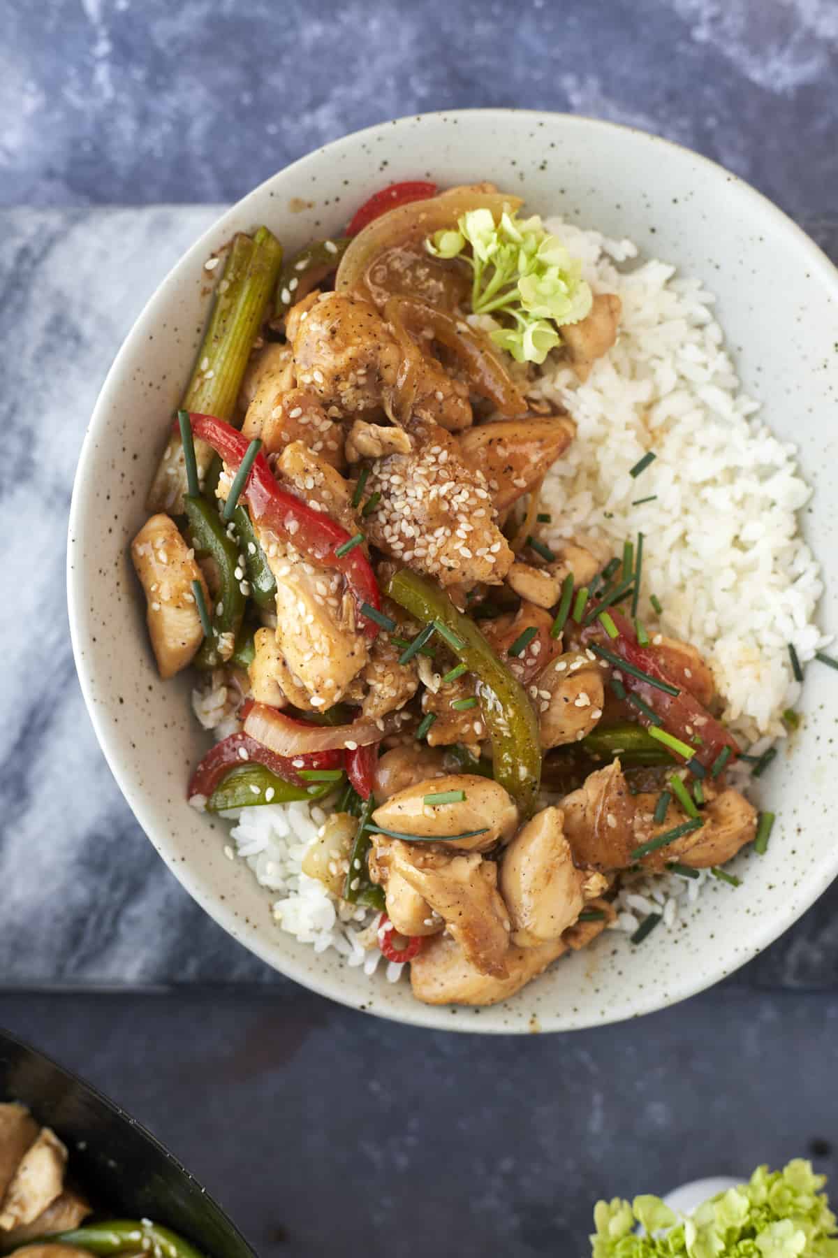 white rice topped with Asian chicken stir fry