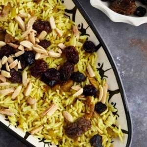 a platter of Persian jeweled rice with dried fruit and nuts
