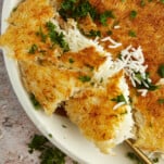 a spoon scooping up a portion of Persian rice