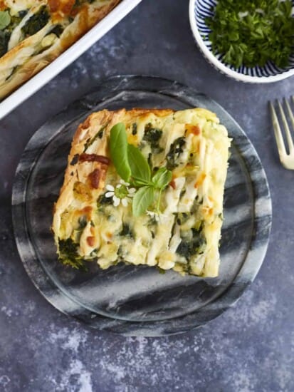 A slice of easy spanakopita on a plate.