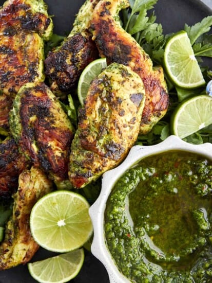 Spicy cilantro lime chicken with zhoug sauce.
