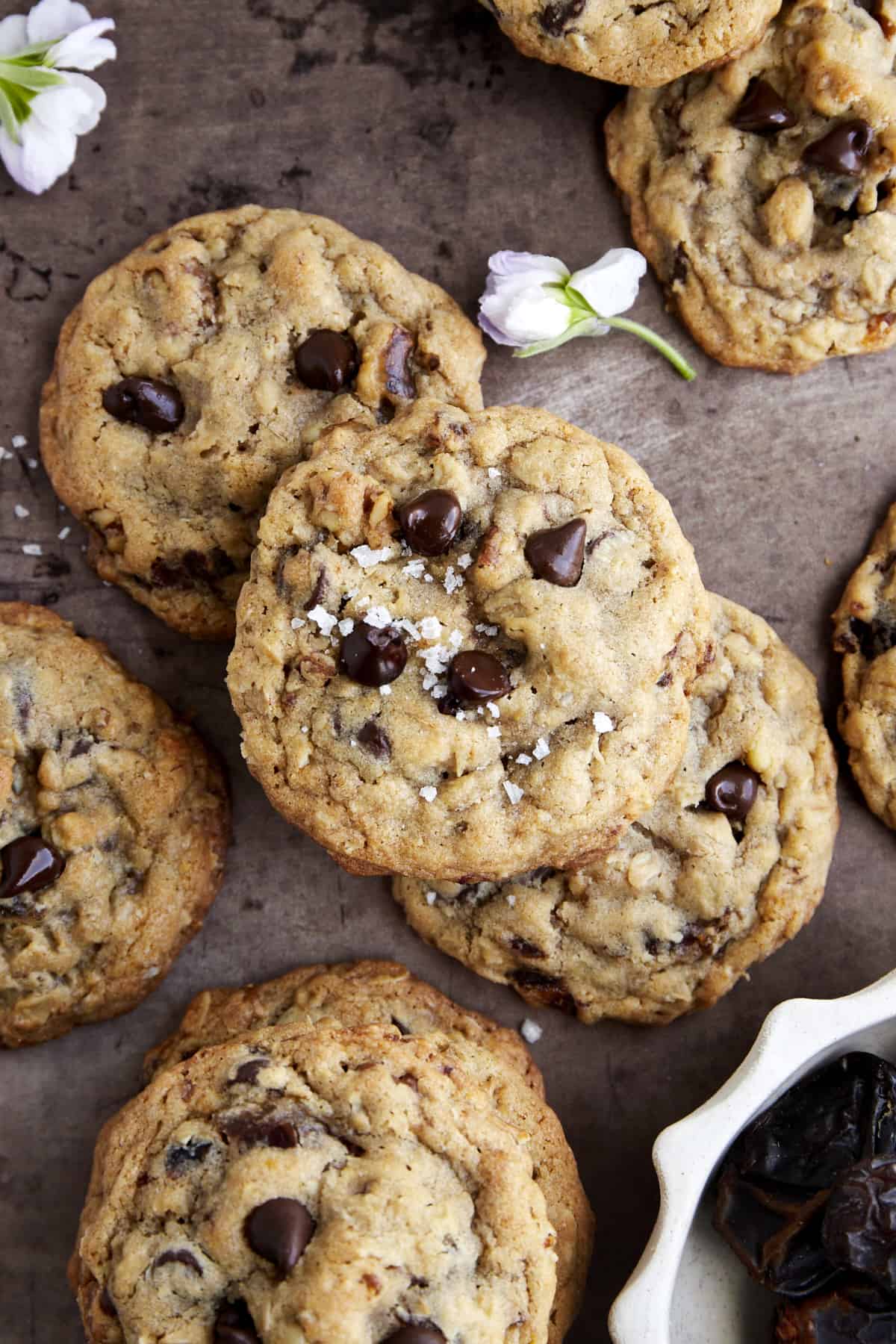 Overhead image of baked date cookies with chocolate chips and walnuts. 