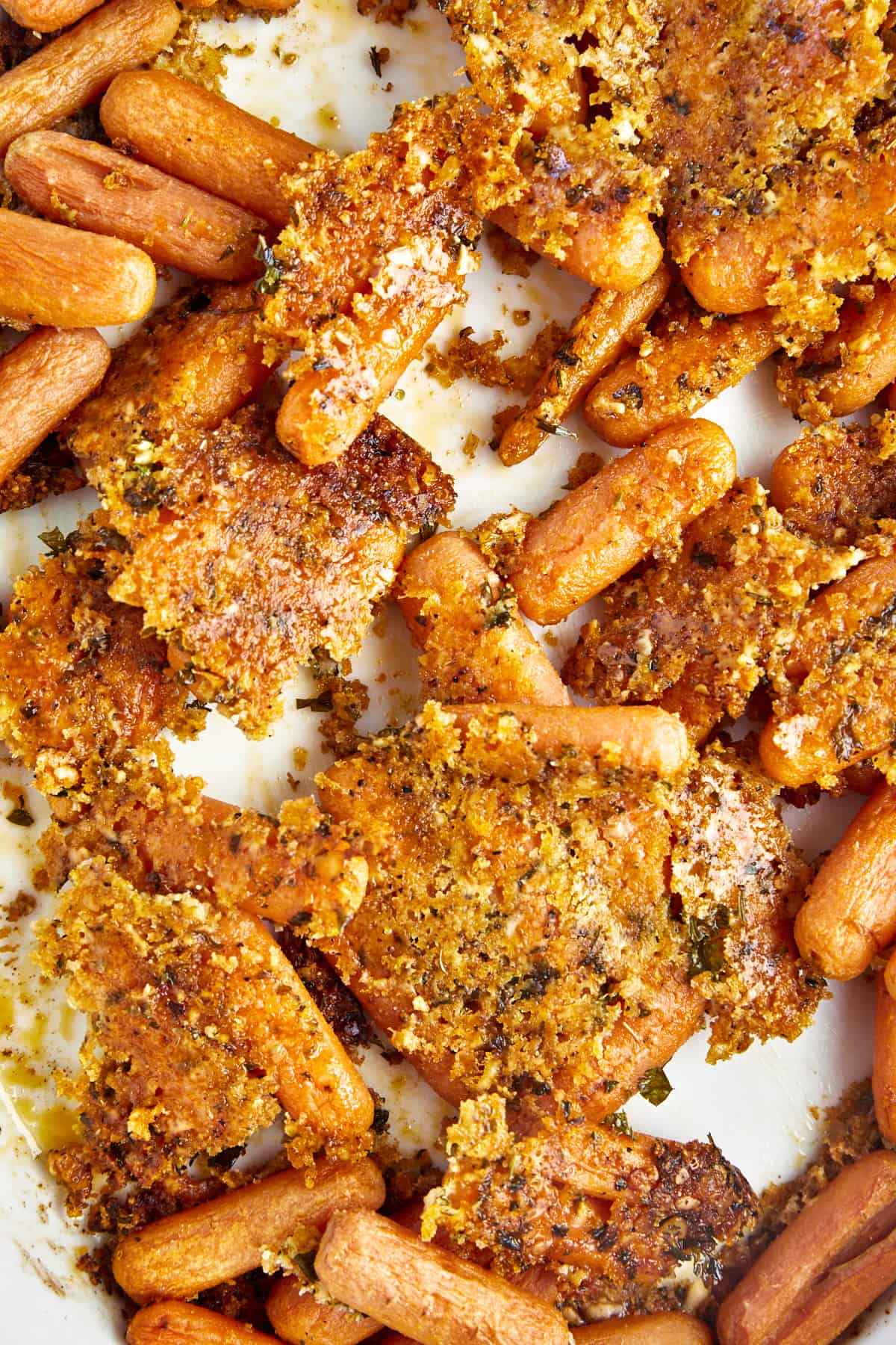 Close up image of Parmesan oven roasted baby carrots. 