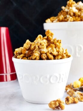 A small bowl full of caramel popcorn.