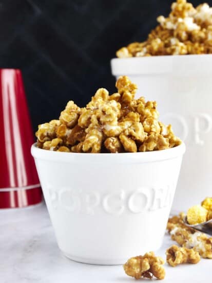 A small bowl full of caramel popcorn.