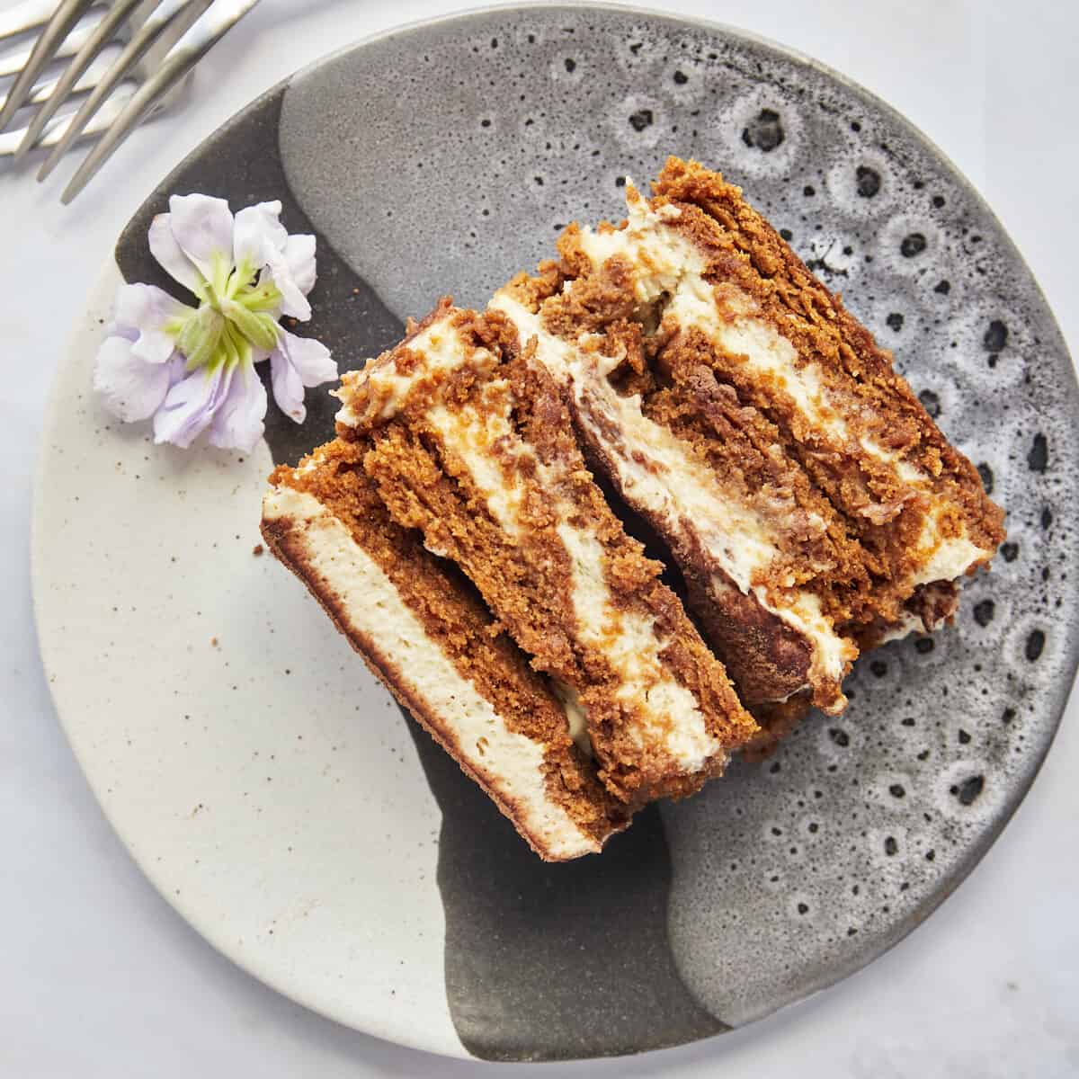 A slice of Biscoff tiramisu on a plate.