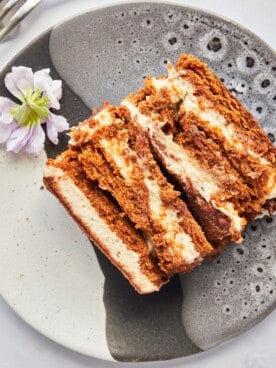 A slice of Biscoff tiramisu on a plate.