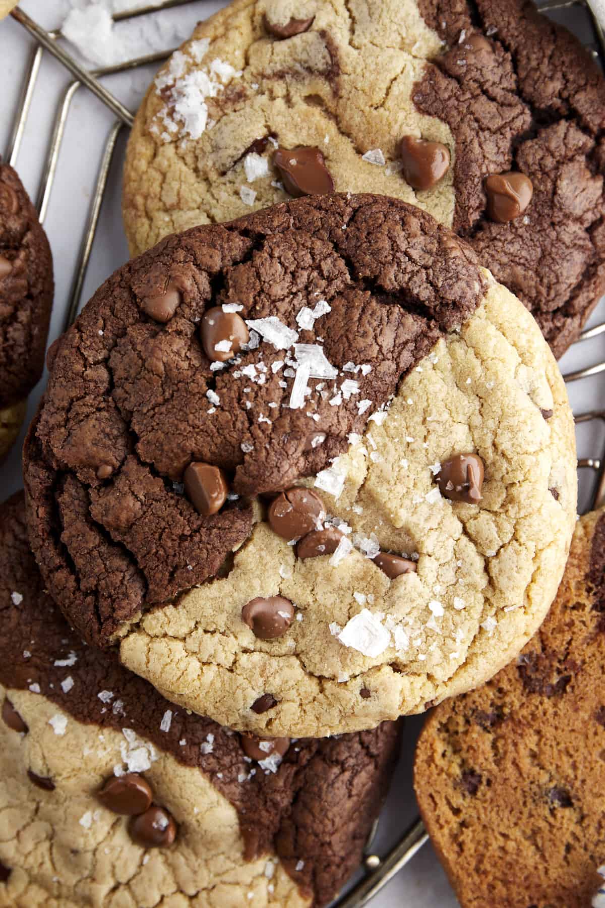 Close up image of a brown butter brookies cookie topped with flakey salt. 