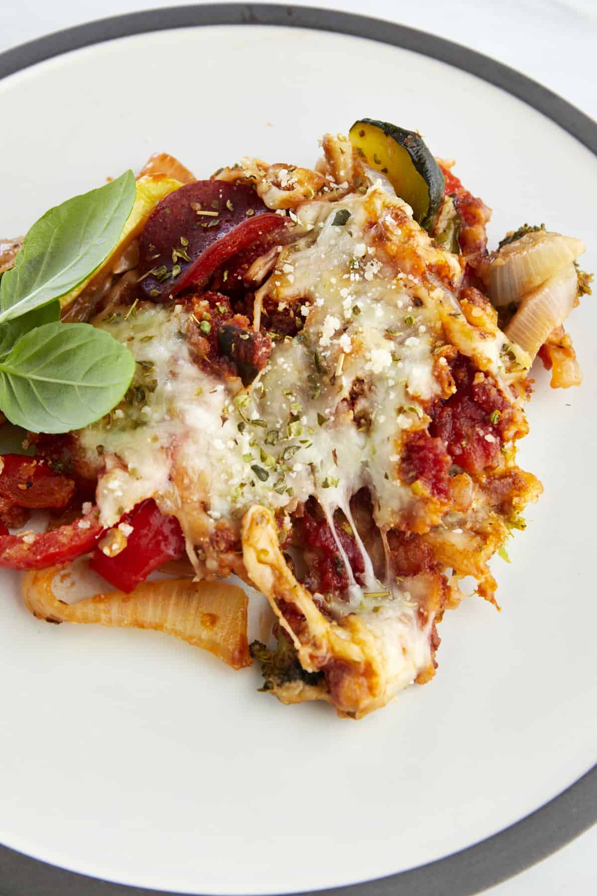 Sheet pan veggie pizza bake on a plate. 