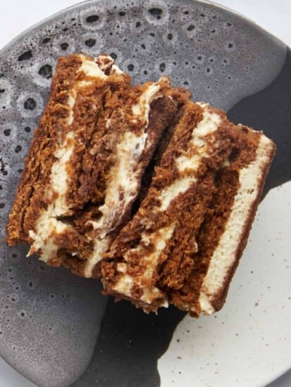 A slice of Biscoff tiramius showing the layers of cookie and filling.