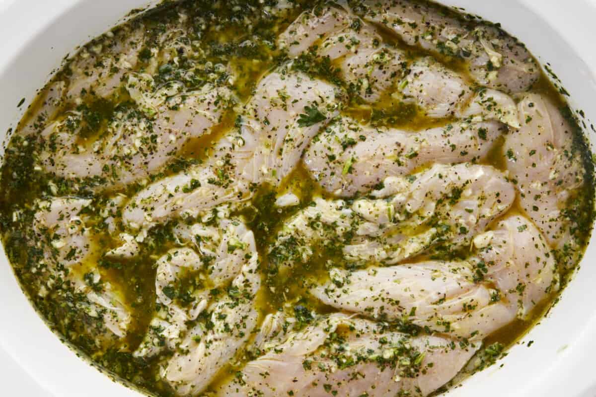 Chicken tenders in an olive oil lime marinade.