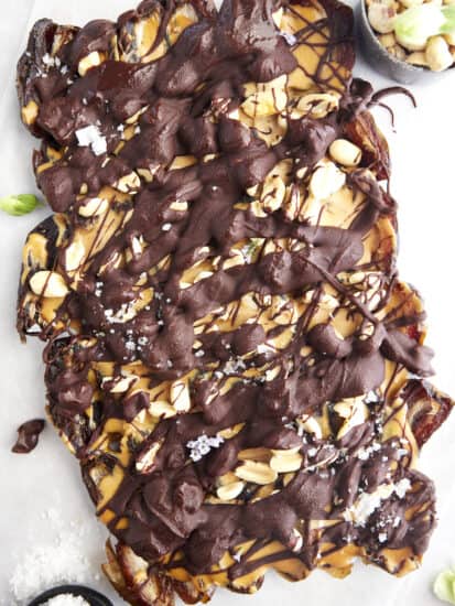 A slab of Snickers date bark topped with flakey salt.