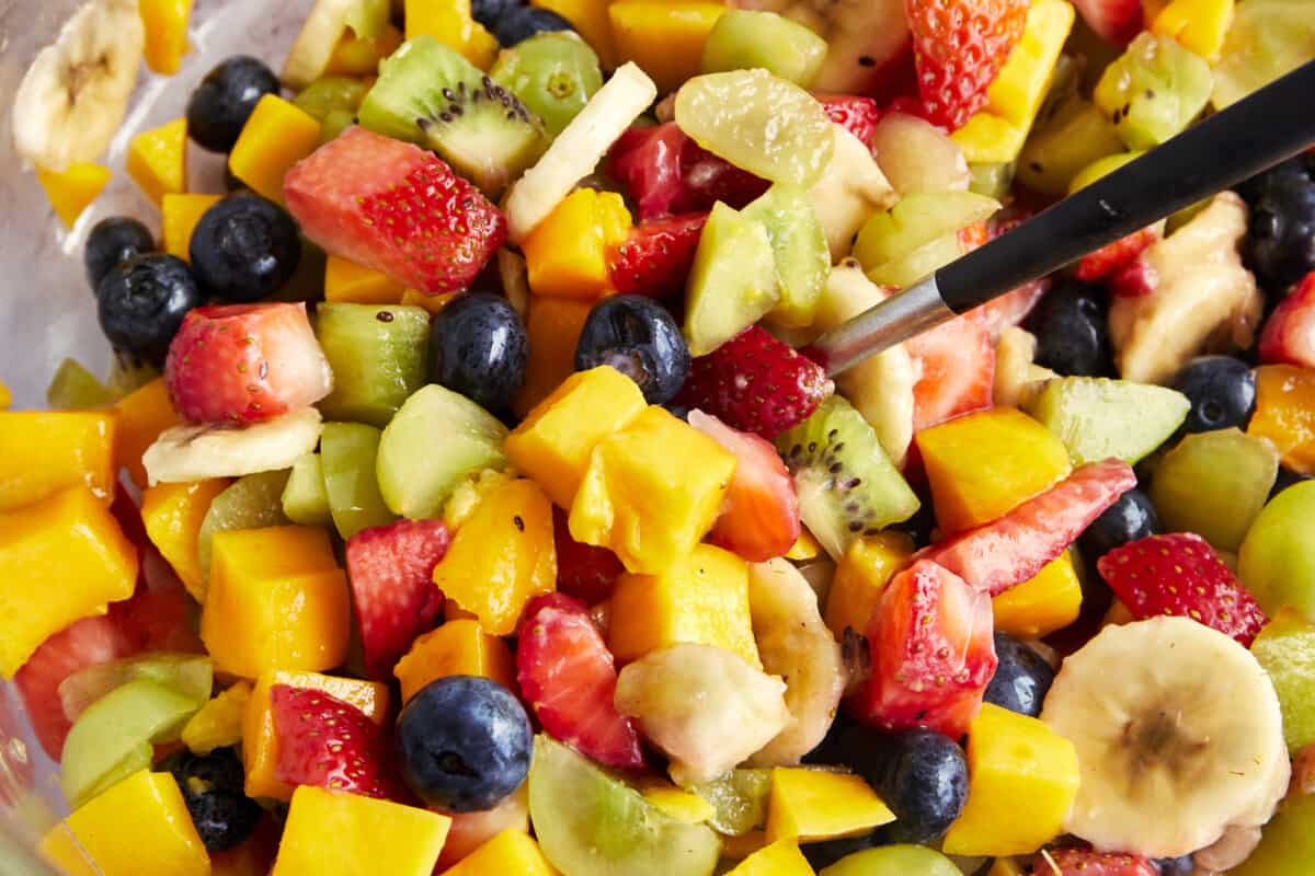 Close up image of an assortment of chopped fruit. 