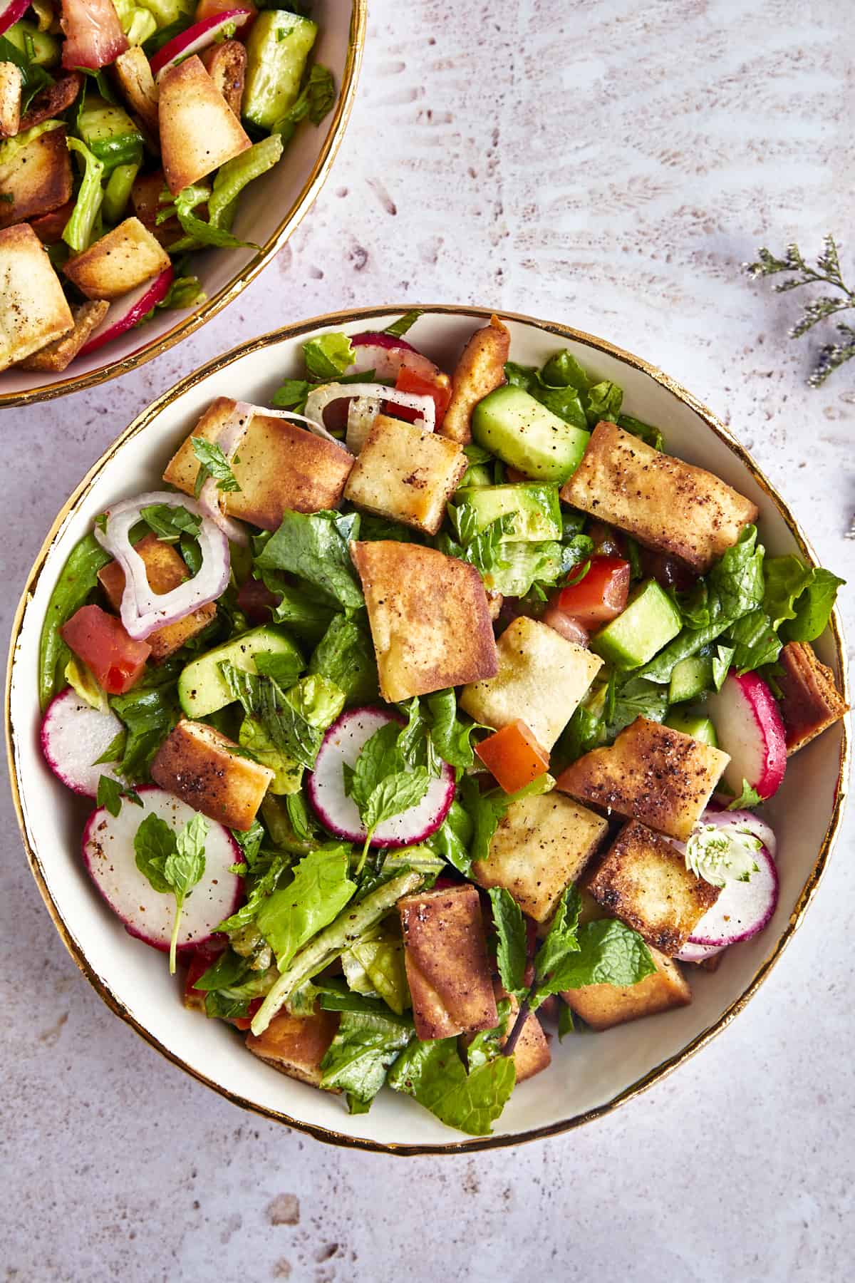 Overhead image of a bowl of fattoush salad. 