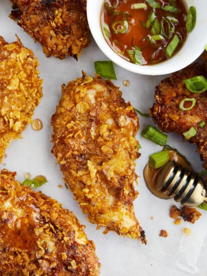 Baked cornflake chicken with a side of hot honey.
