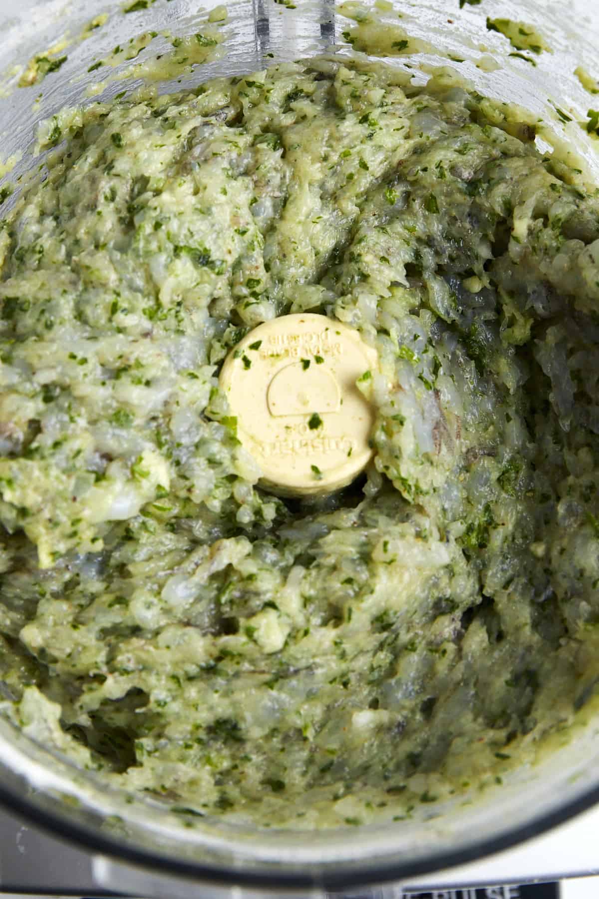 Shrimp kofta mixture in a food processor.