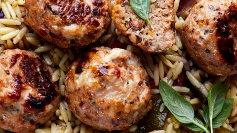 Sun-dried tomato chicken meatballs over rice.