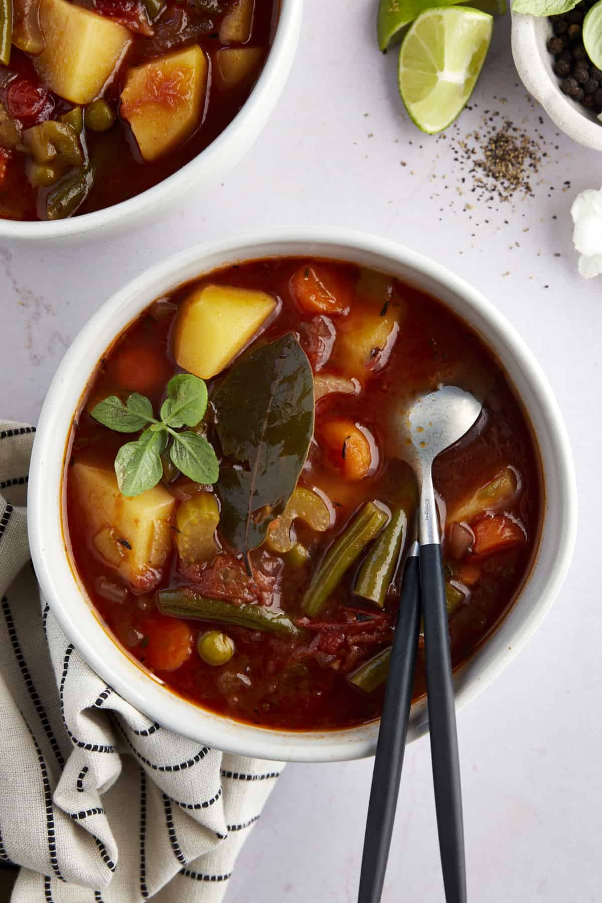 Overhead image of a bowl of slow cooker vegetable soup. 