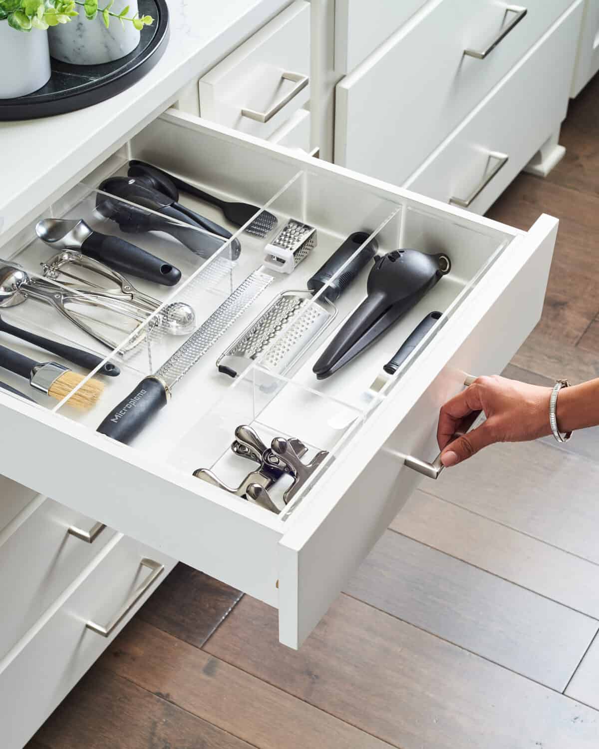 open drawer of kitchen utensils.
