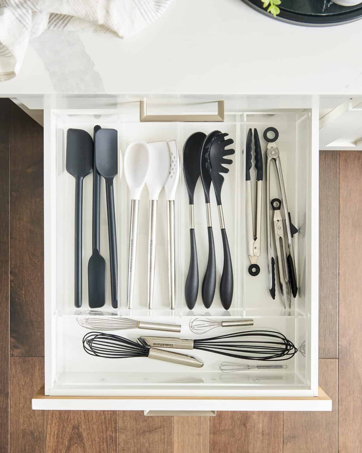 open drawer will kitchen tools.