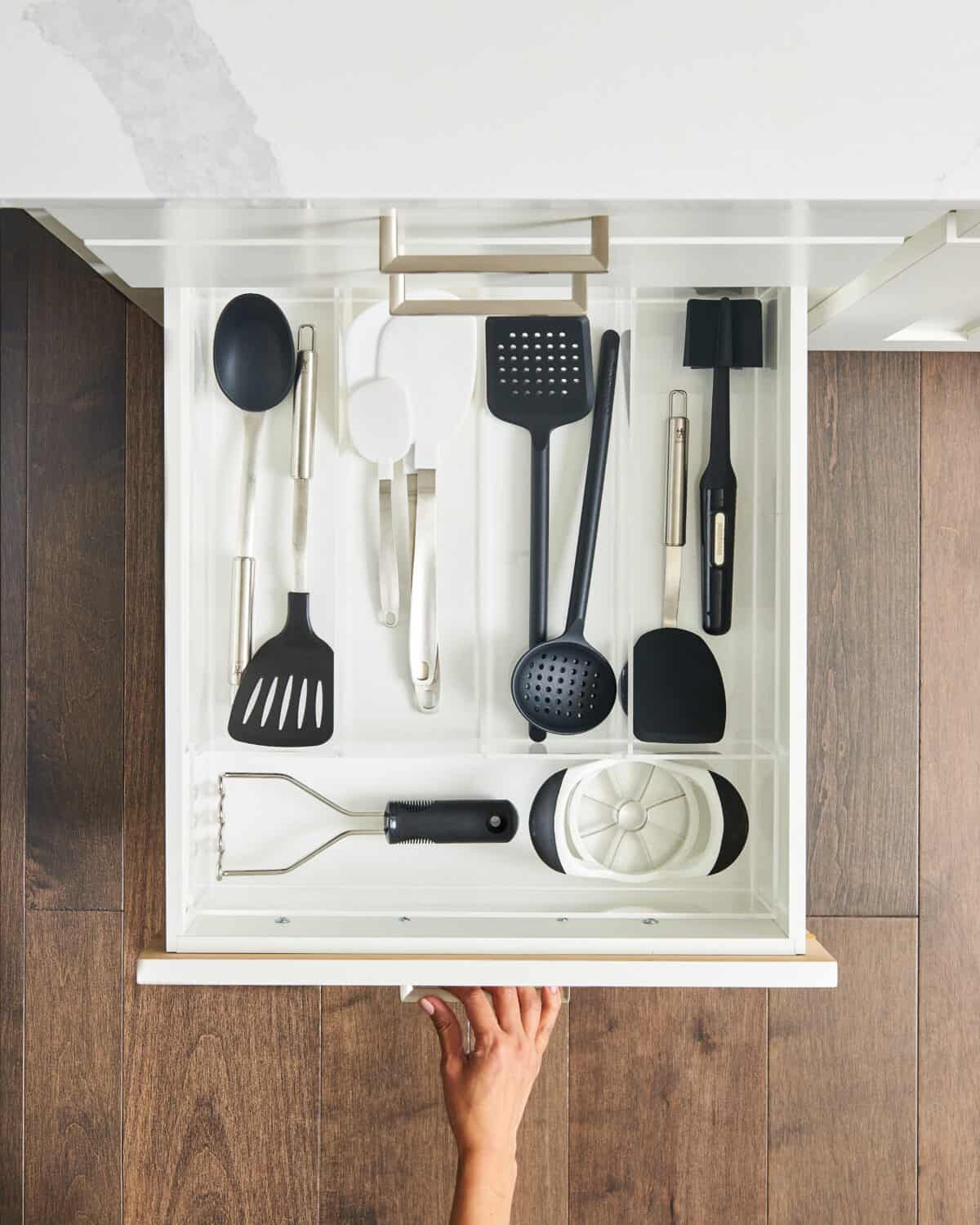 spatulas and other kitchen tools in a drawer.