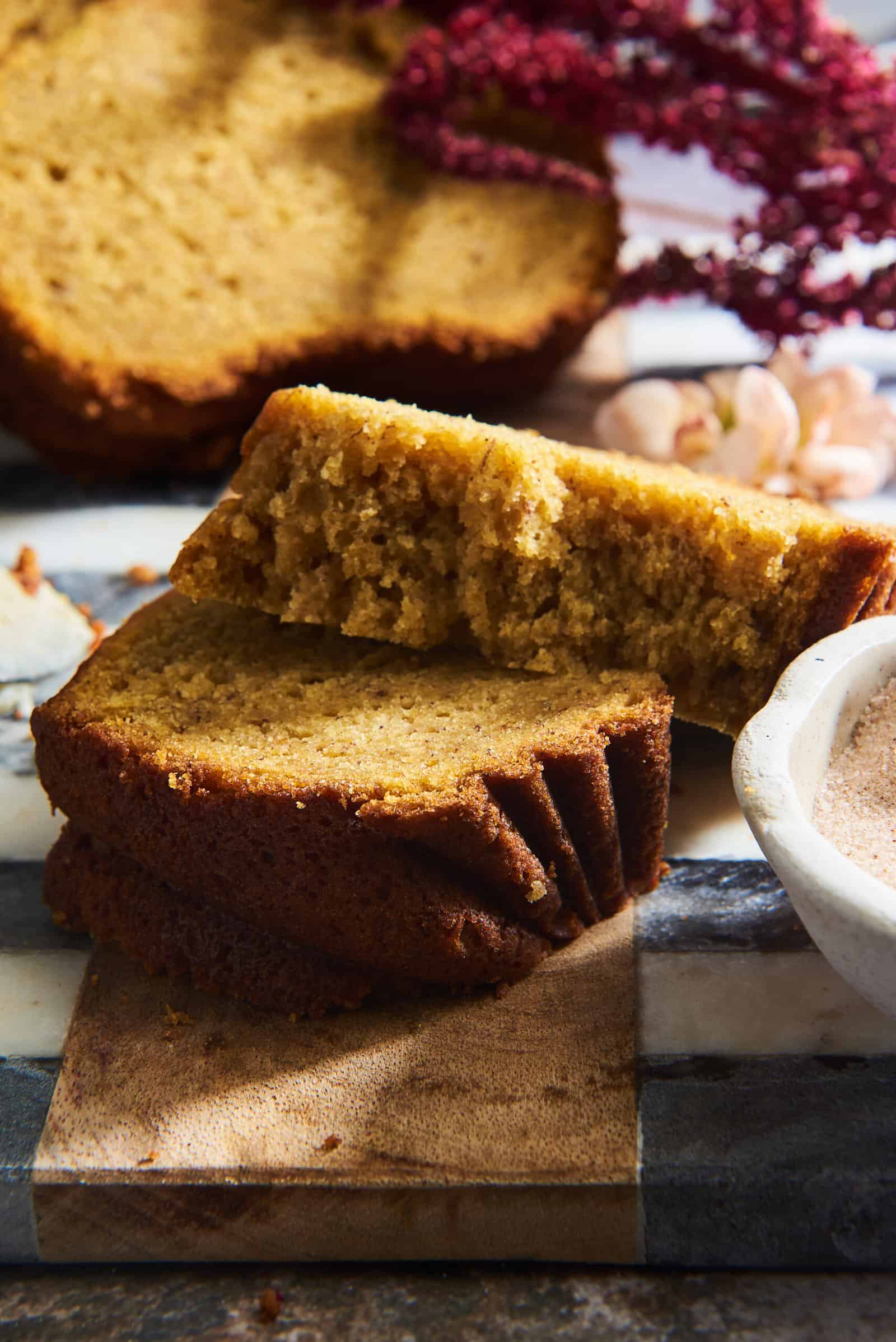 Two slices of pumpkin banana bread.