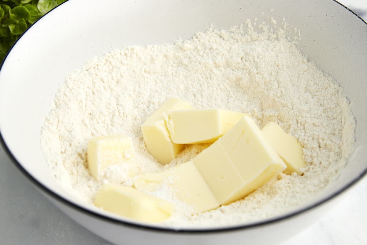 Butter in a bowl of flour. 