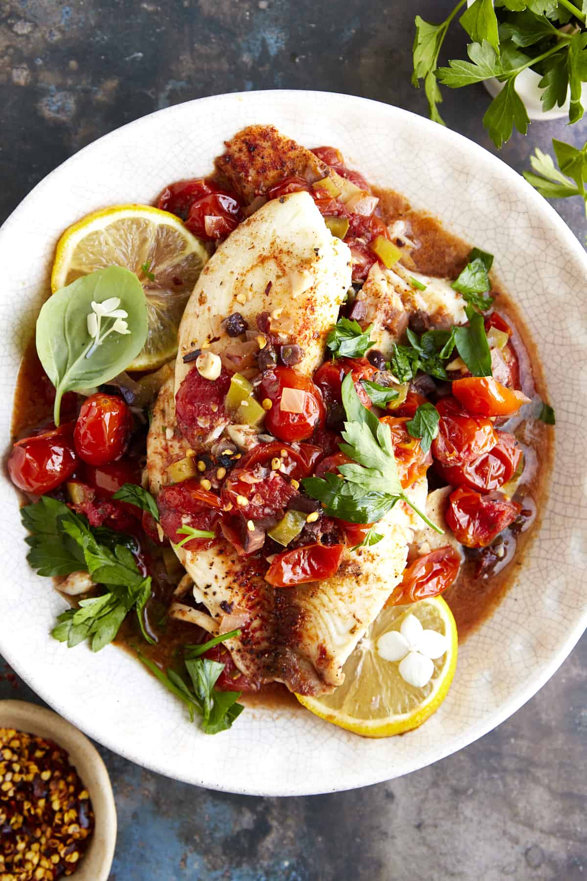 A bowl of Mediterranean tilapia. 