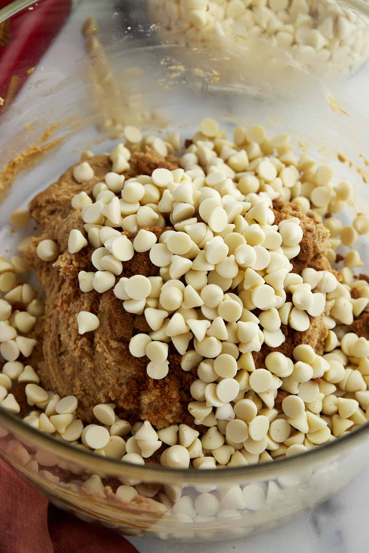 Biscoff cookie dough topped with white chocolate chips. 