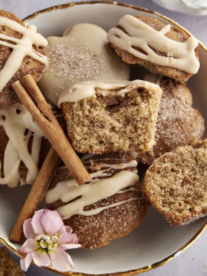 A plate of maple glazed apple cider muffins.