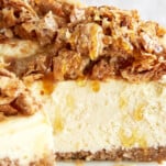 Baklava cheesecake with a slice missing.