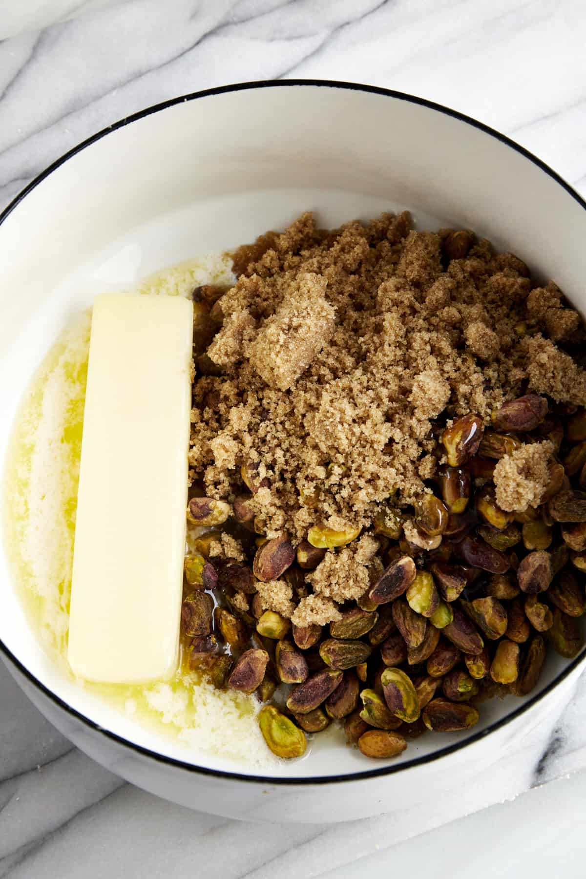Butter, pistachios, brown sugar, and salt in a saucepan. 