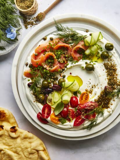 Smoked salmon cream cheese dip on a plate.