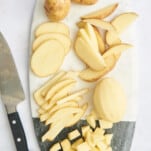 Whole potatoes, peeled potatoes, potato slices, wedges, fries, and cubes.