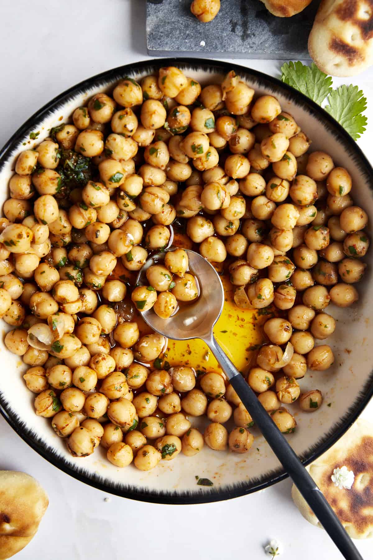 A bowl of marinated chickpeas. 