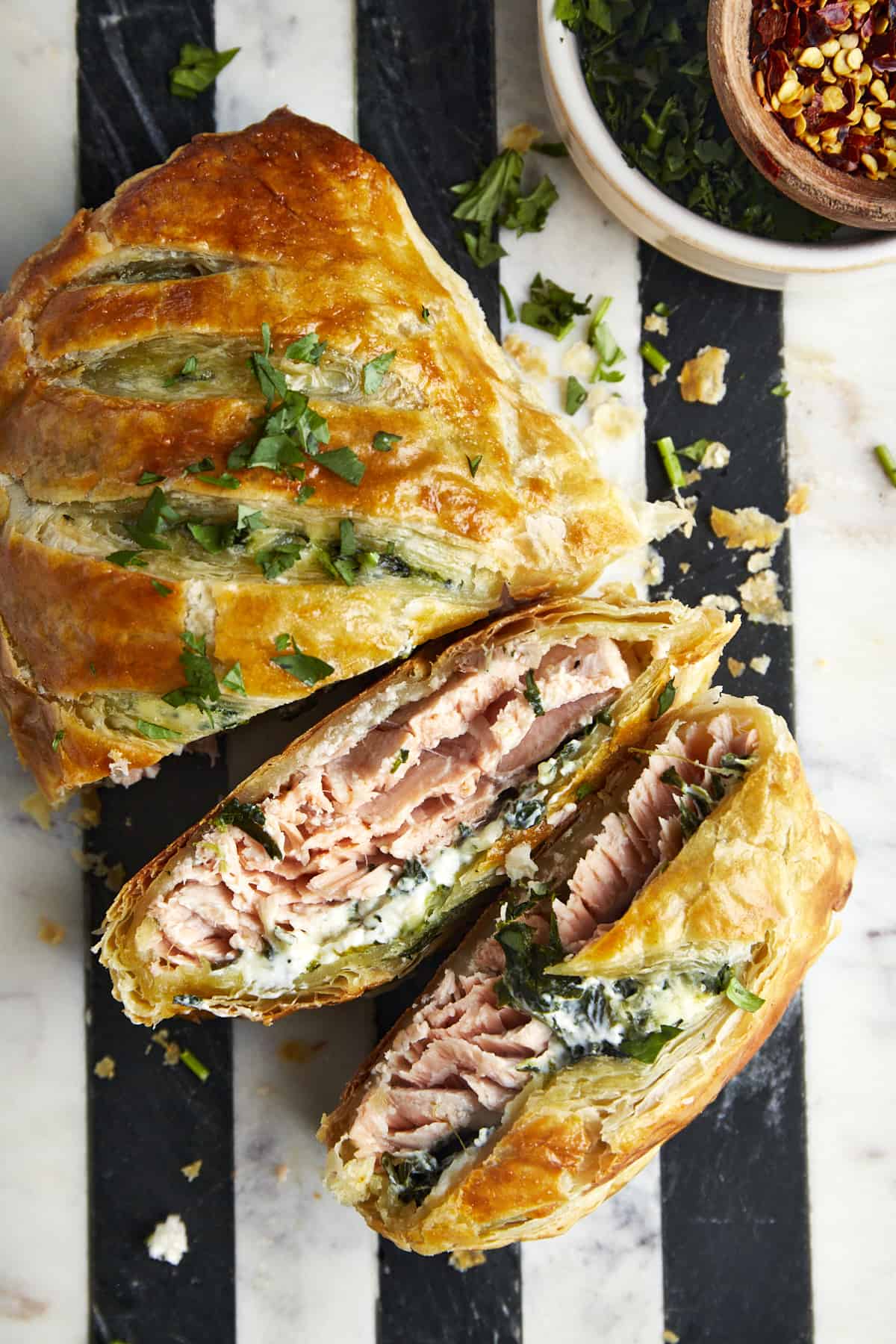 Salmon Wellington with two servings sliced. 