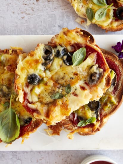 Sheet pan pizza made with bread slices.