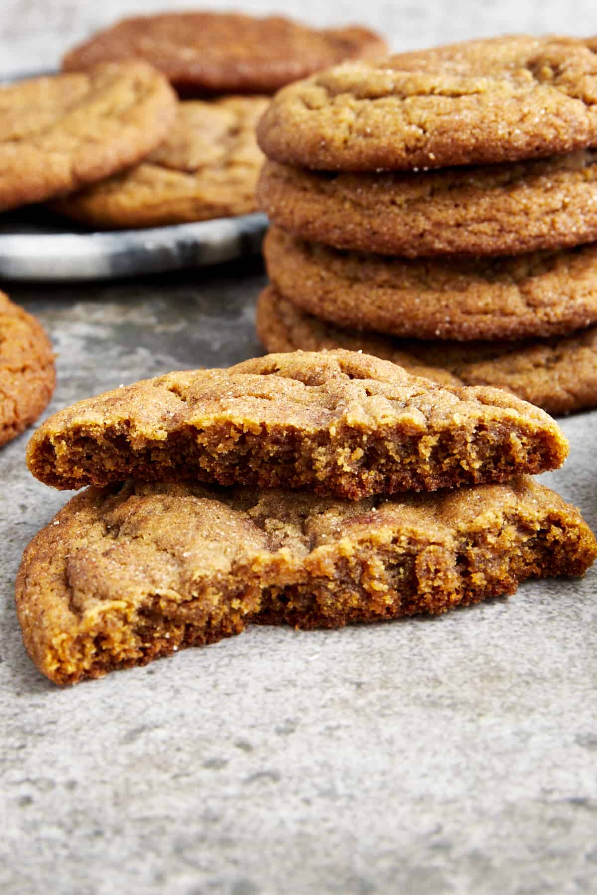 Gingerbread cookies with one split in half. 